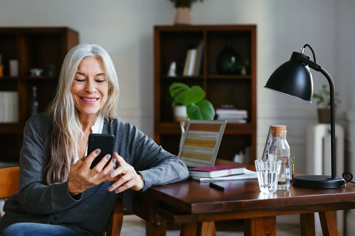 Patient at home using a smartphone
